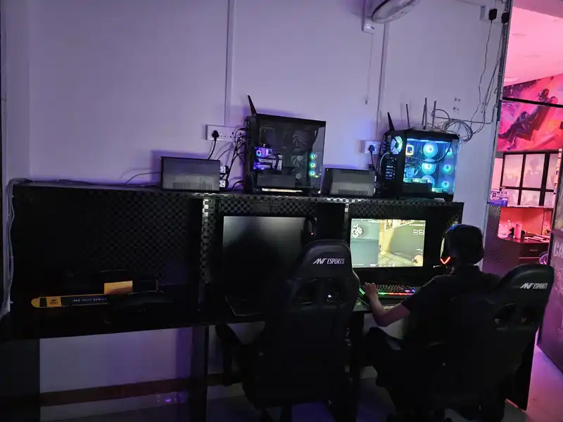 Gaming PC setup at Pro X Gaming with an RGB-lit tower, monitor and gaming chair